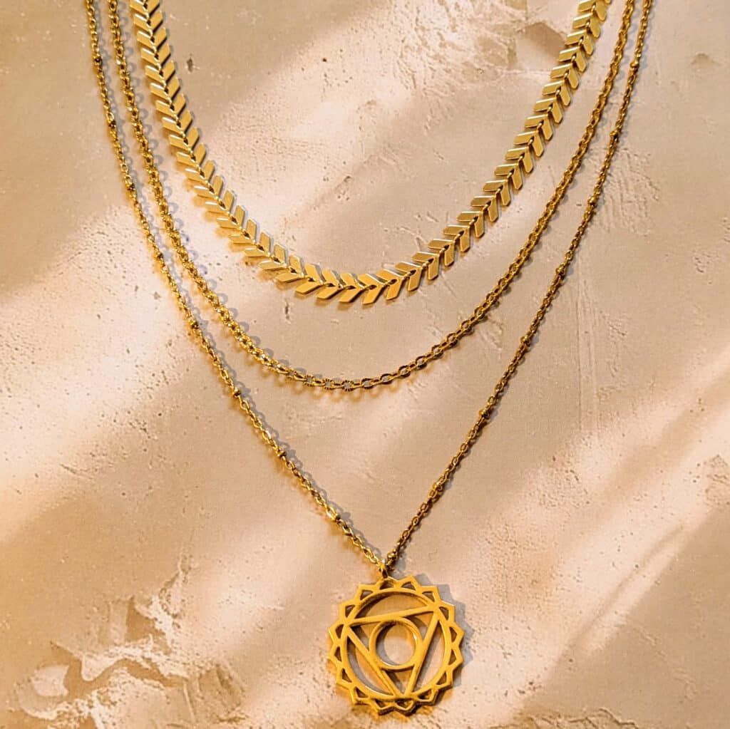 Collier triple rangs or femme